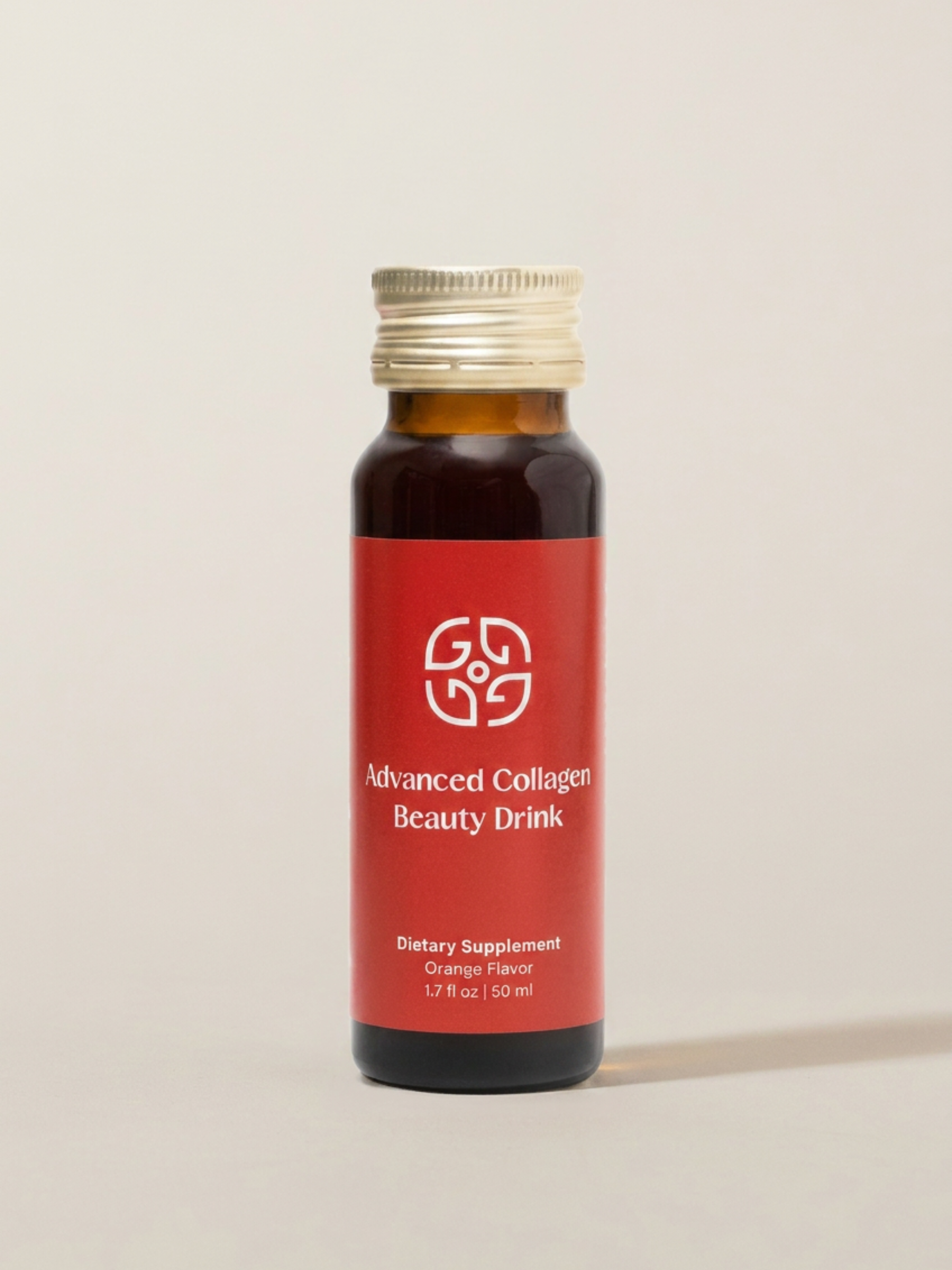 Bottle of premium collagen beauty drink with orange flavor.