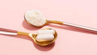 Collagen Powder and Pills on Pink Background