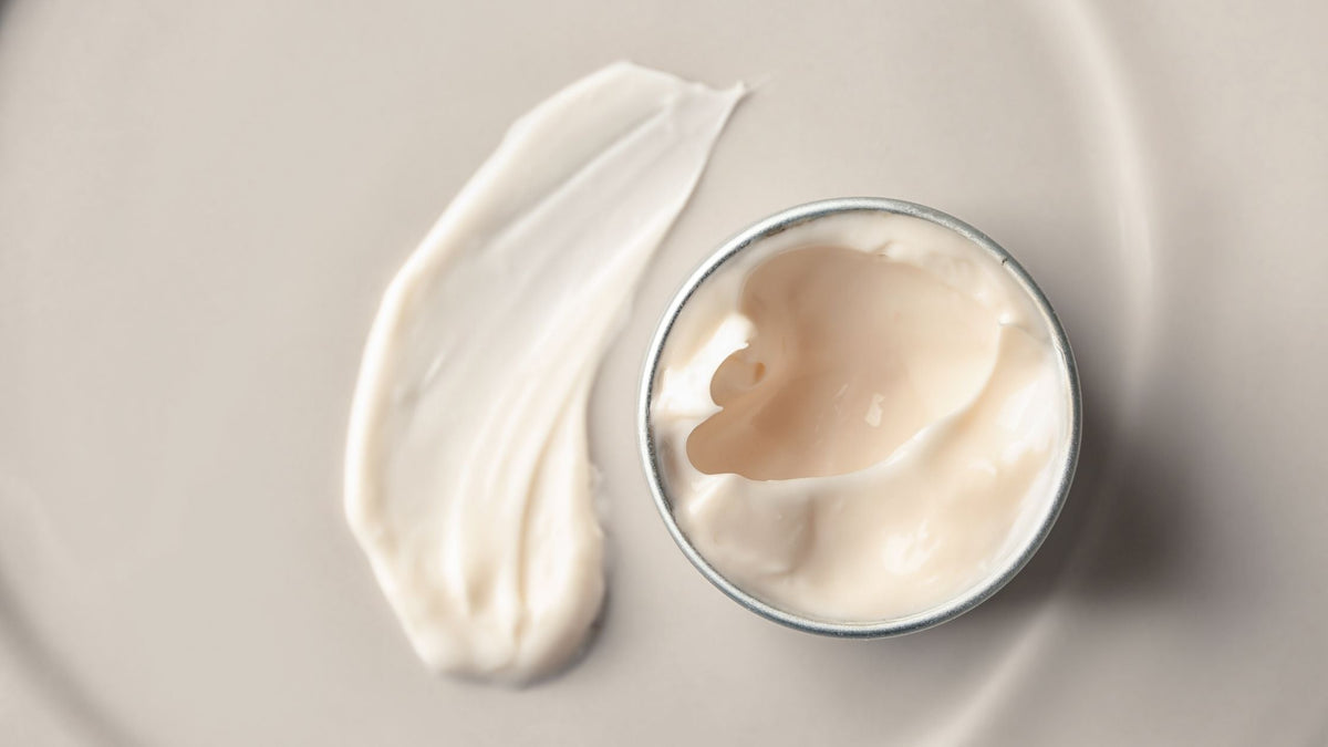 Jar with Natural Cream on Light Background