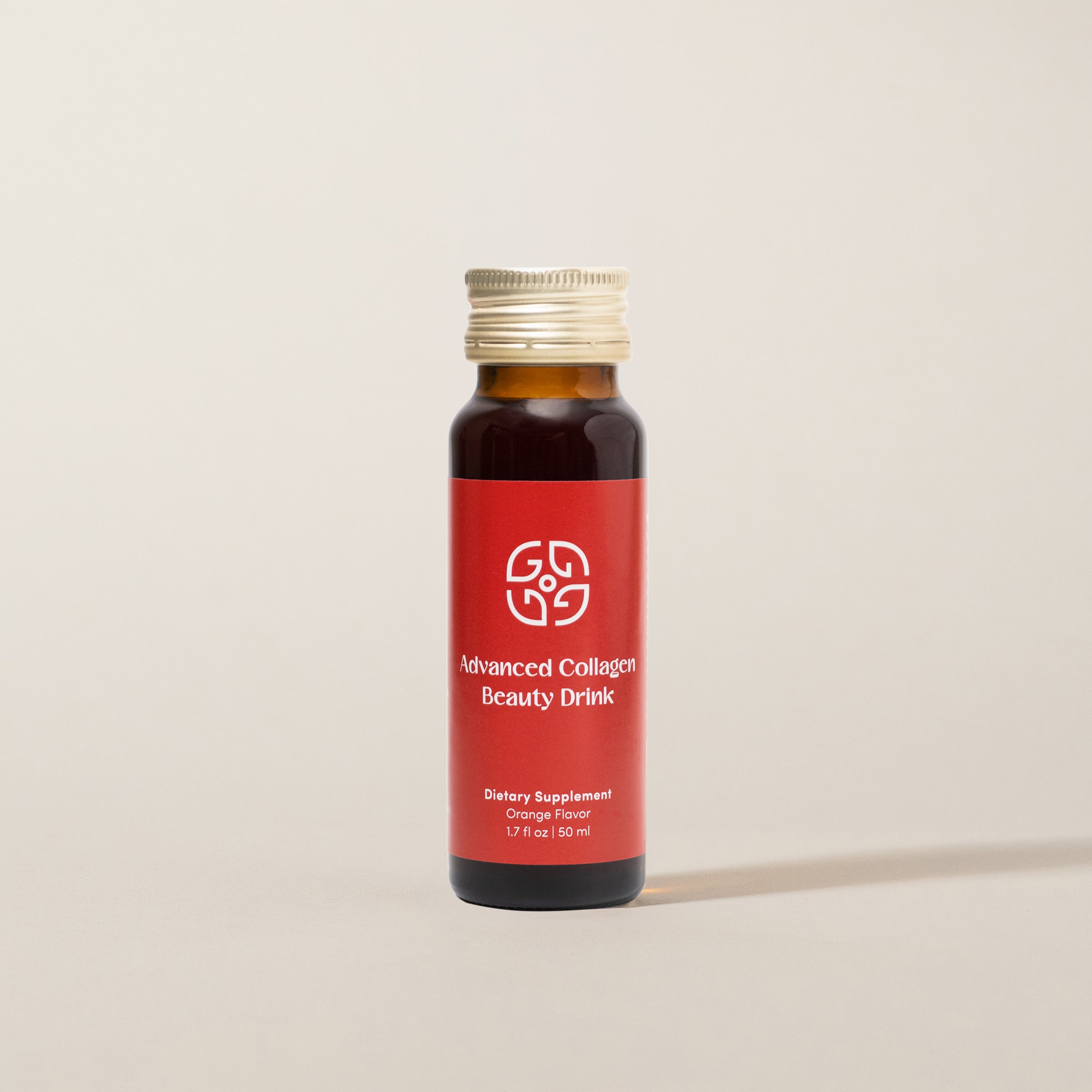 Bottle of premium collagen beauty drink with orange flavor.