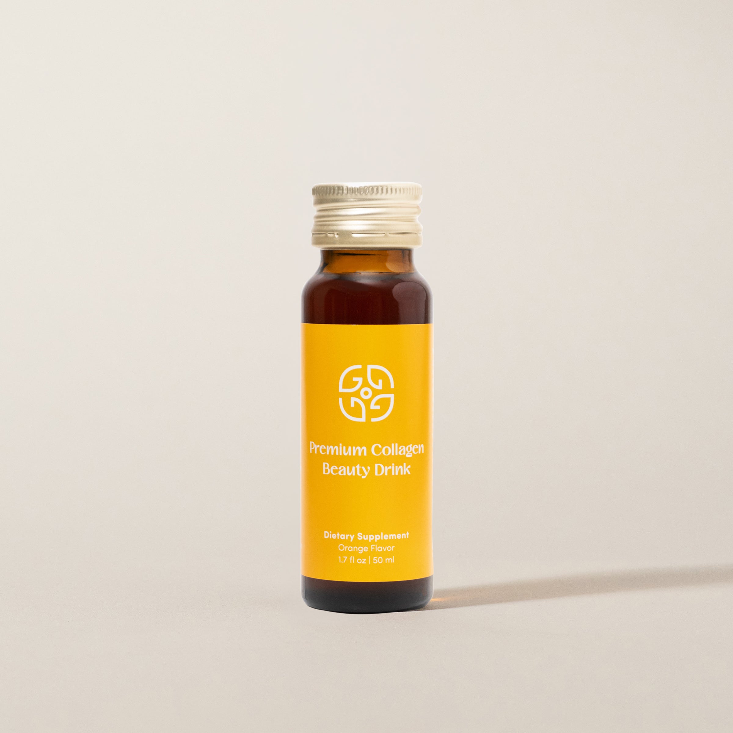 Bottle of premium collagen beauty drink with orange flavor.
