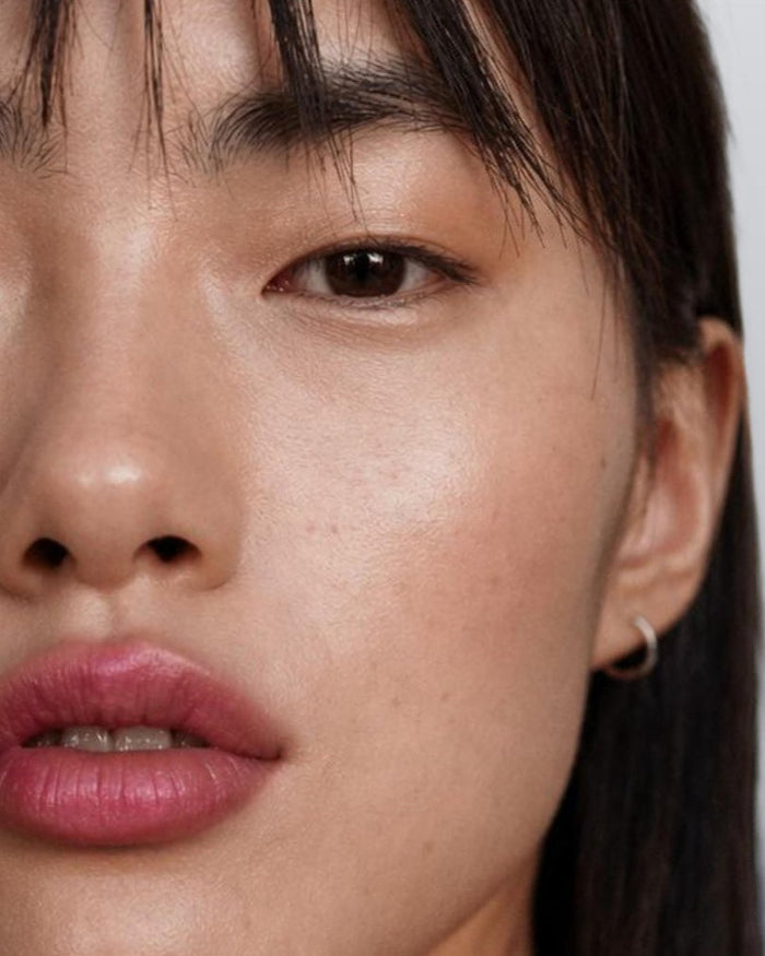Close-up portrait showing natural skin texture
